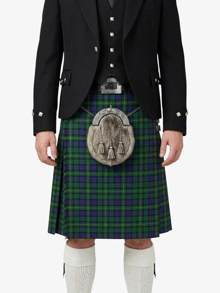 Person wearing a traditional Scottish kilt with a black jacket on a white background