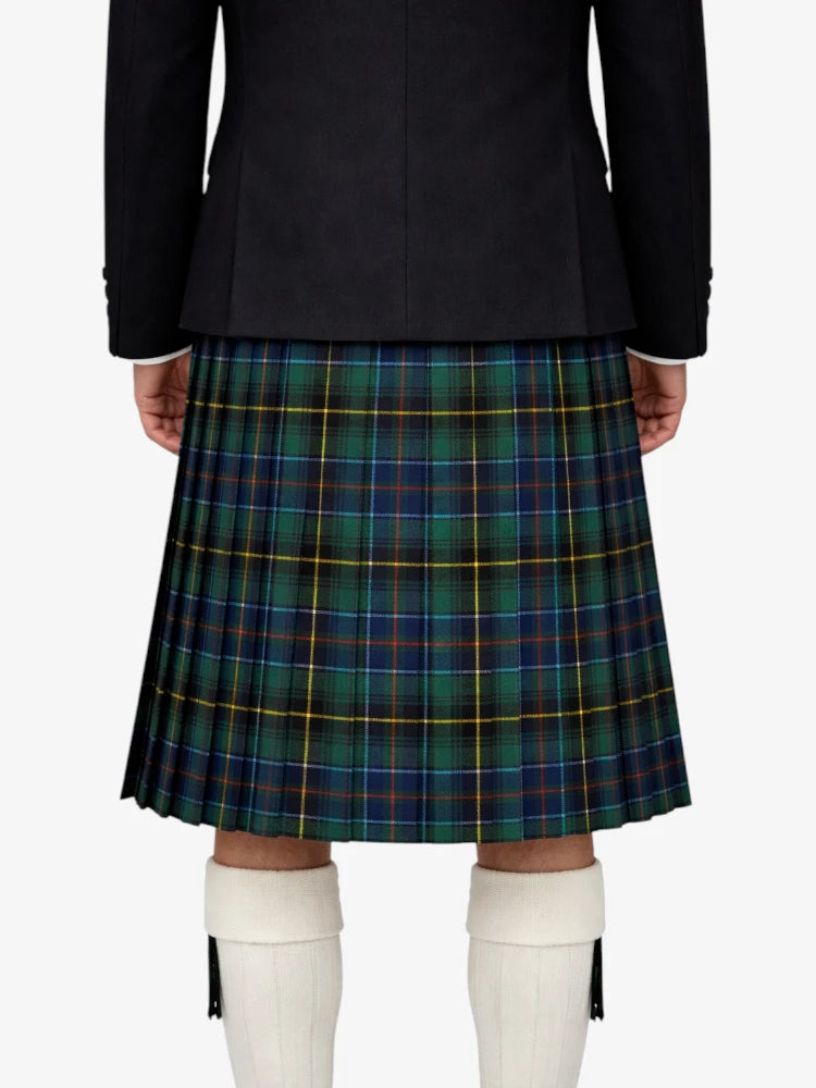 Person wearing a black jacket and green plaid kilt on a white background