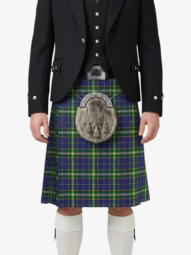 Person wearing a traditional Scottish kilt with a tartan pattern on a white background