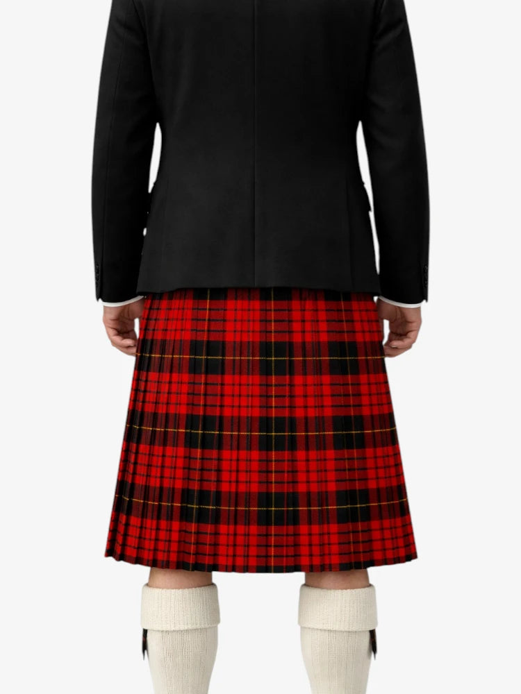 Person wearing a black jacket and red plaid kilt on a white background