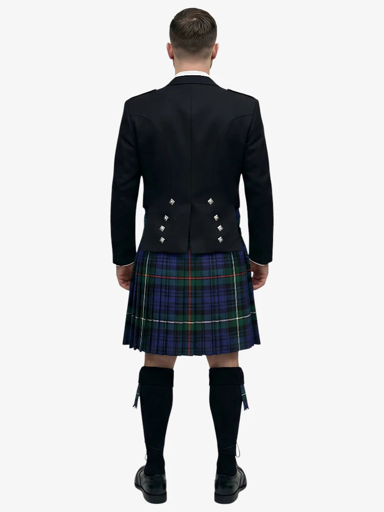 Person wearing a black prince charlie jacket and plaid mackenzie tartan kilt on a white background