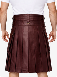 Maroon pleated kilt worn by a person on a white background