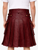 Maroon pleated skirt with gold buttons worn by a person on a white background
