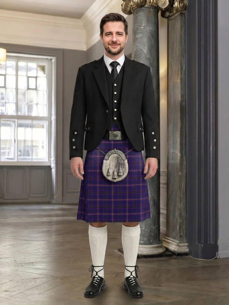 Man wearing a traditional Scottish kilt in an elegant interior setting
