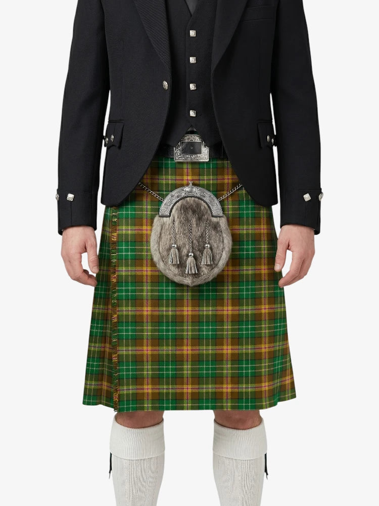 Person wearing a traditional Scottish kilt with a tartan pattern on a white background