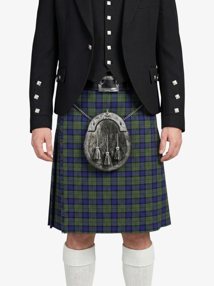 Person wearing a traditional Scottish kilt with a tartan pattern on a white background