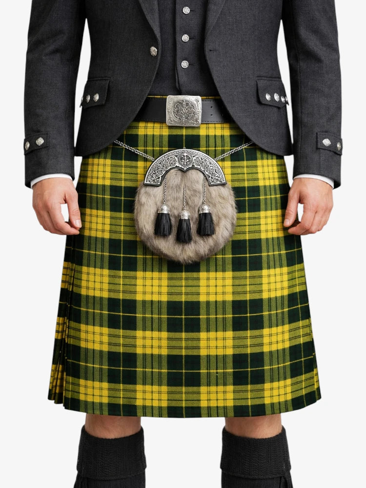 Person wearing a yellow and green plaid kilt with a gray jacket on a white background