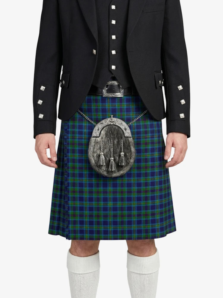 Person wearing a dark jacket and green plaid kilt with a silver sporran on a white background