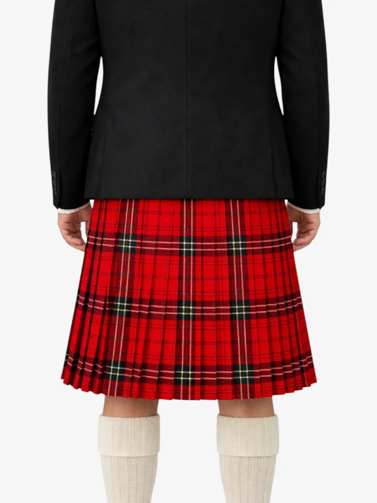 Person wearing a black coat and red plaid kilt on a white background