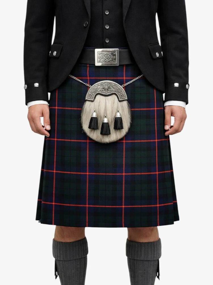 Person wearing a traditional Scottish kilt with a sporran on a white background