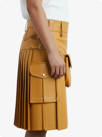 Yellow pleated skirt with a white top on a white background