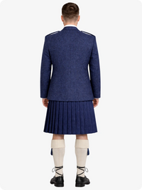 Person wearing a blue blazer and pleated skirt with white socks and black shoes on a white background