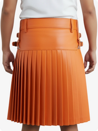 Orange pleated skirt with belt on a white background