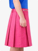 Pink skirt with button details worn by a person on a white background