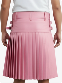Pink pleated skirt worn by a person on a white background