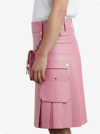 Pink pleated skirt worn by a person on a white background