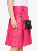 Person wearing a bright pink skirt with a black pouch on a white background