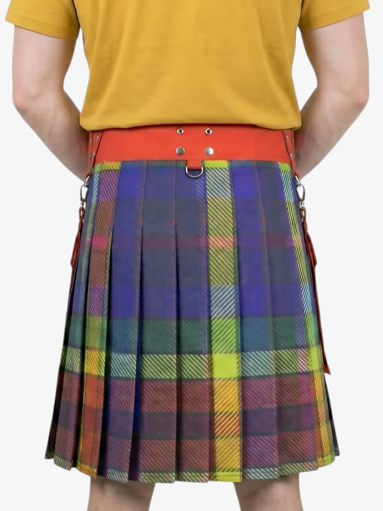 Person wearing a colorful plaid kilt with an orange waistband on a white background