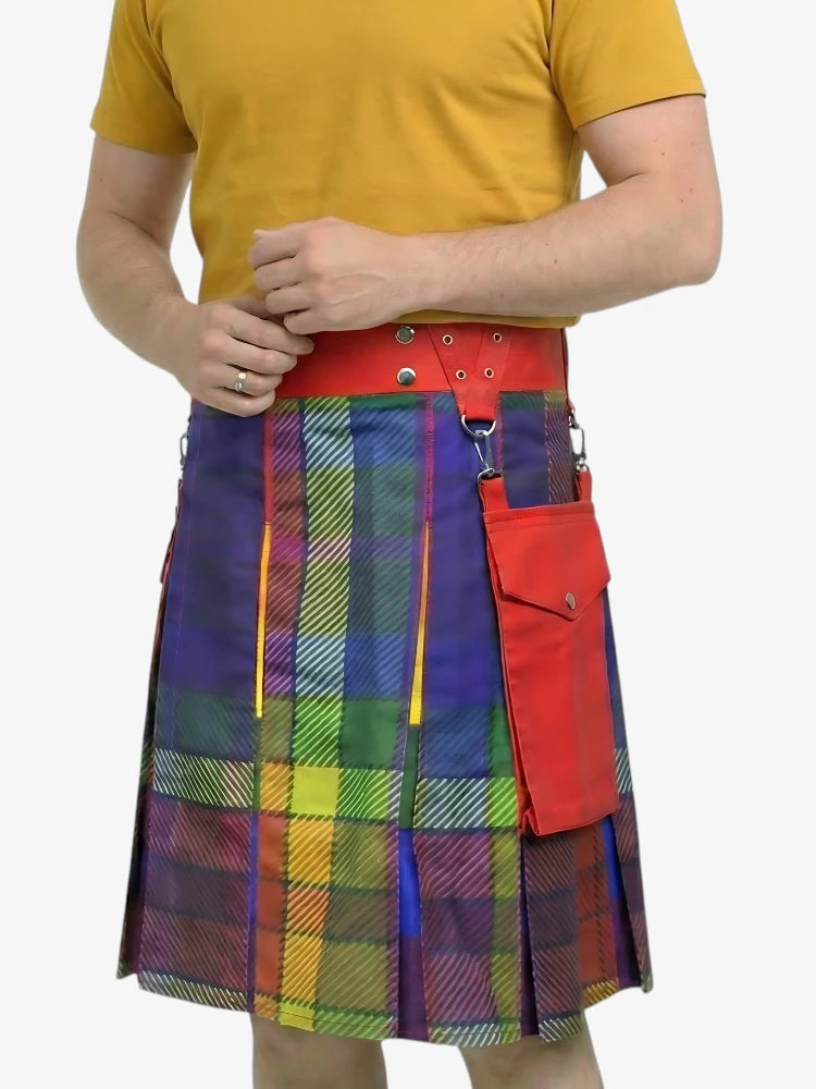 Person wearing a colorful plaid kilt with a red belt on a white background
