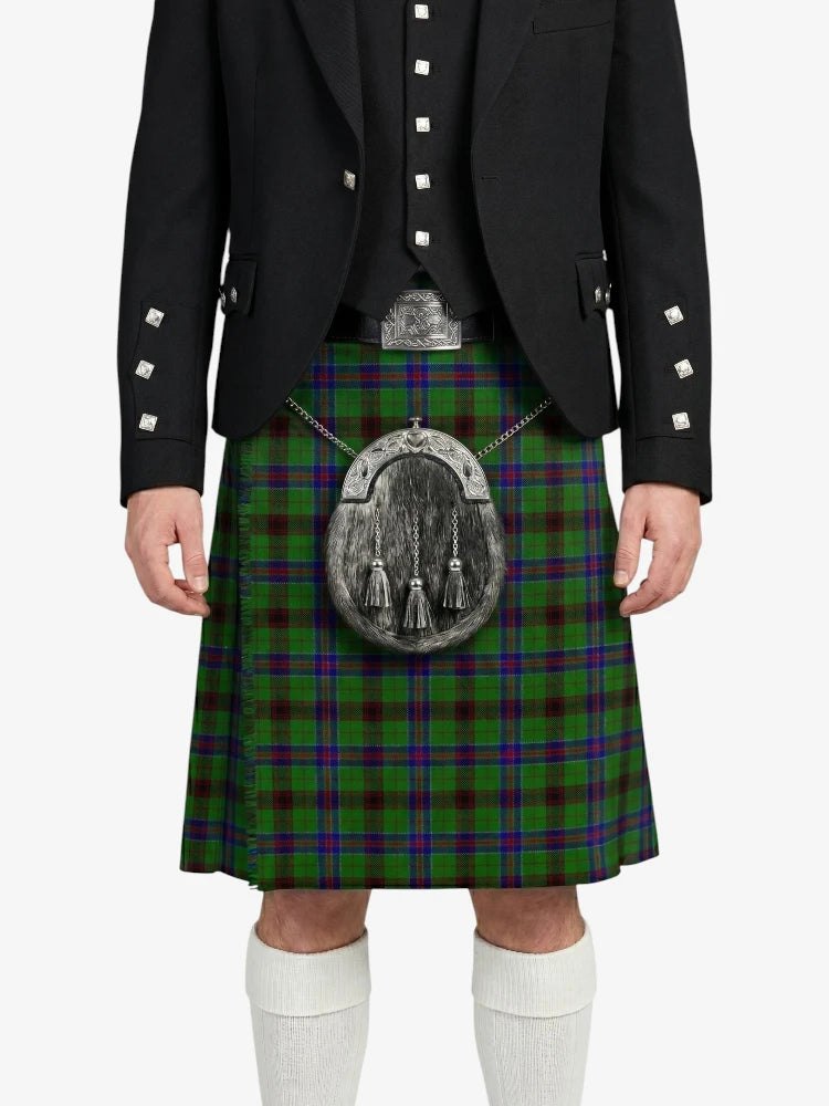 Person wearing a black jacket and green plaid kilt with a silver sporran on a white background