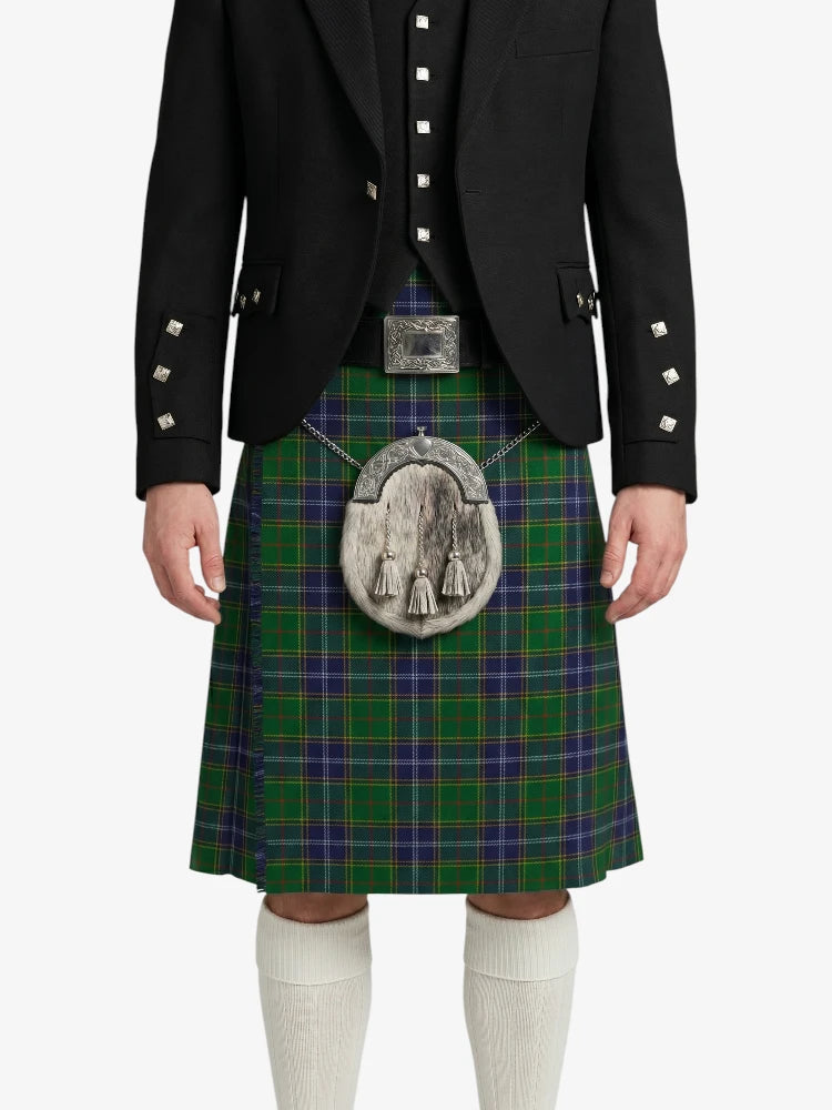 Person wearing a black jacket and green plaid kilt with a silver sporran on a white background