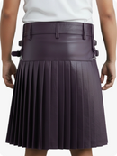 Person wearing a pleated purple skirt with belt and buttons on a white background