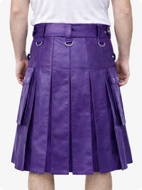 Purple kilt worn by a person on a white background
