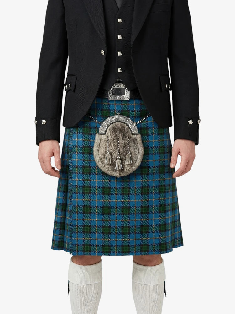 Person wearing a traditional Scottish kilt with a tartan pattern on a white background