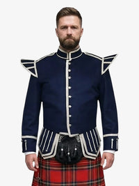 Man wearing a navy doublet jacket with white accents and a red plaid kilt on a white background