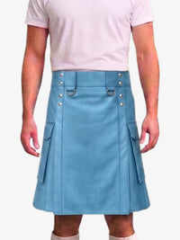 A person wearing a light blue faux-leather kilt with silver-tone metal hardware, side pockets, and a belt loop, paired with a pale pink t-shirt against a light gray background.