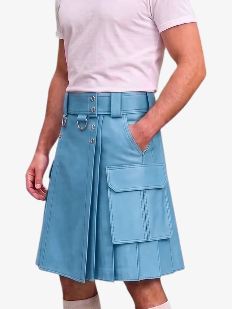 A person wearing a light blue pleated kilt-style skirt with a matching belt, metal ring details, and large front cargo pockets, paired with a pale pink T-shirt against a plain light background.