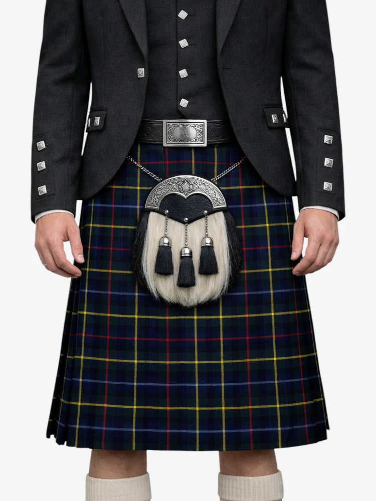 Person wearing a traditional Scottish kilt with a sporran on a white background