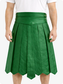 Standard Green pleated skirt worn by a person on a white background