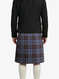 Person wearing a black jacket and plaid kilt on a white background