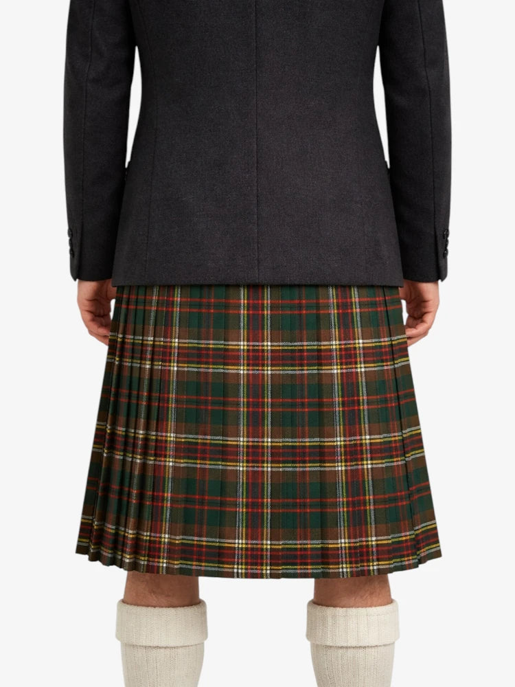 Person wearing a dark coat and plaid kilt on a white background