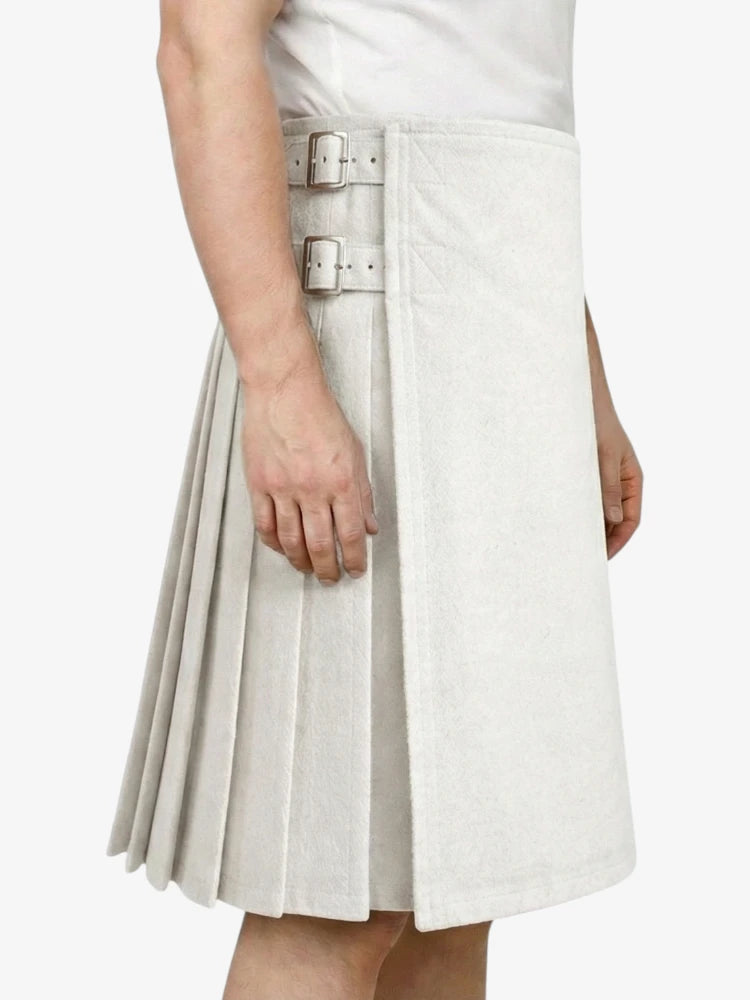 White pleated skirt with a belt on a white background
