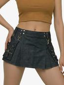 Black skirt with multiple pockets and metal accents on a plain background