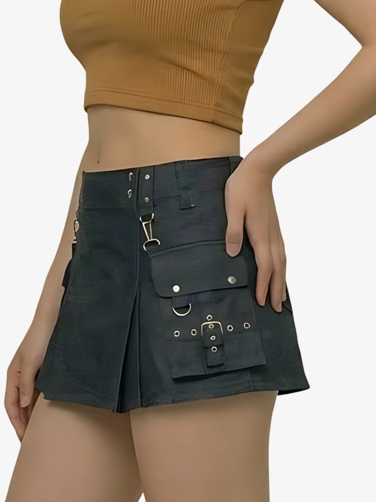 Black utility skirt with multiple pockets and zippers worn by a person on a white background