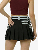 Black pleated skirt with silver belt and pocket details on a white background