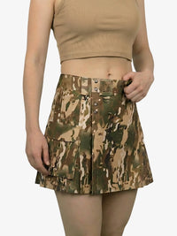 Camouflage skirt worn by a person on a white background