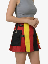 Colorful striped skirt with a black pocket on a plain background