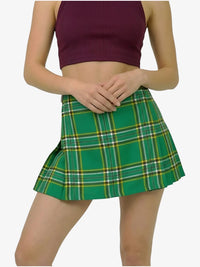 Green plaid skirt worn by a person on a white background