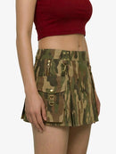 Camouflage skirt with zippers and buttons on a plain background