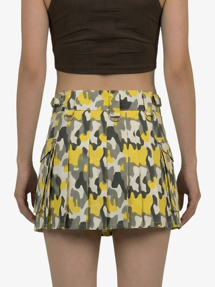 Person wearing a patterned skirt with a plain background