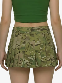 Person wearing a green camouflage skirt and green top on a white background