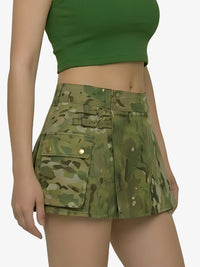 Person wearing a green camouflage skirt on a white background