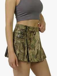 Camouflage skirt worn by a person on a white background