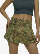 Camouflage skirt worn by a person on a white background