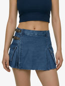 Blue denim skirt worn by a person on a white background